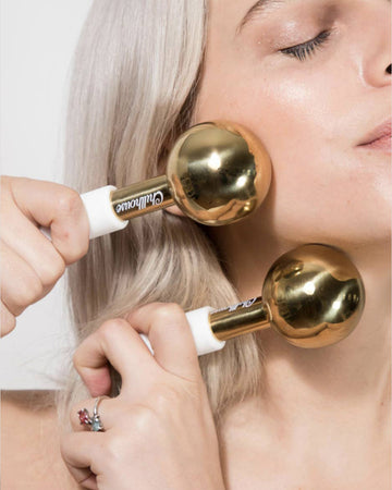 model using gold and white chill globes