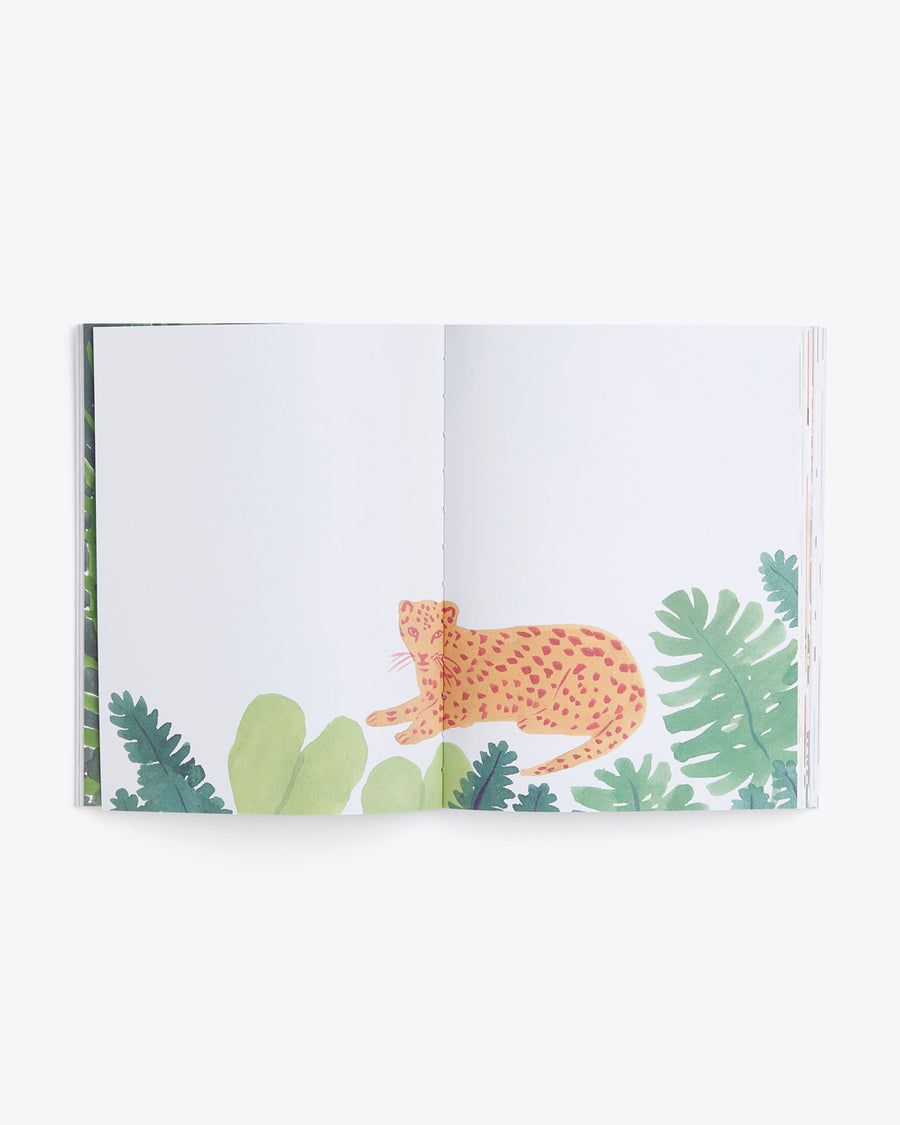 interior image of blank pages featuring a landscape design and a leopard