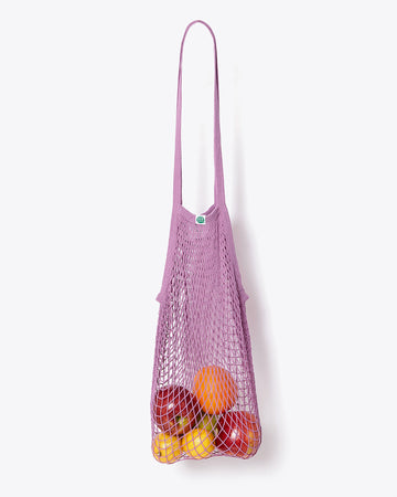 raspberry market bag with long handle and filled with fruit