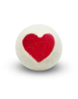 white wool laundry ball with large red heart in the middle