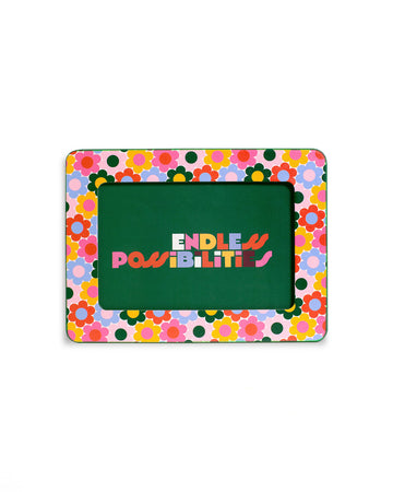 4x6 photo frame with multicolor mod daisies and multicolor 'endless possibilities' text inside the frame