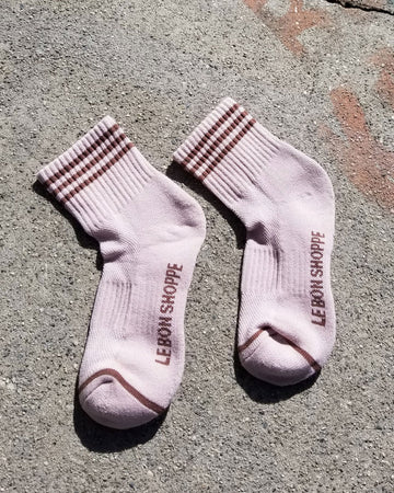 light pink socks with burgundy stripe accents