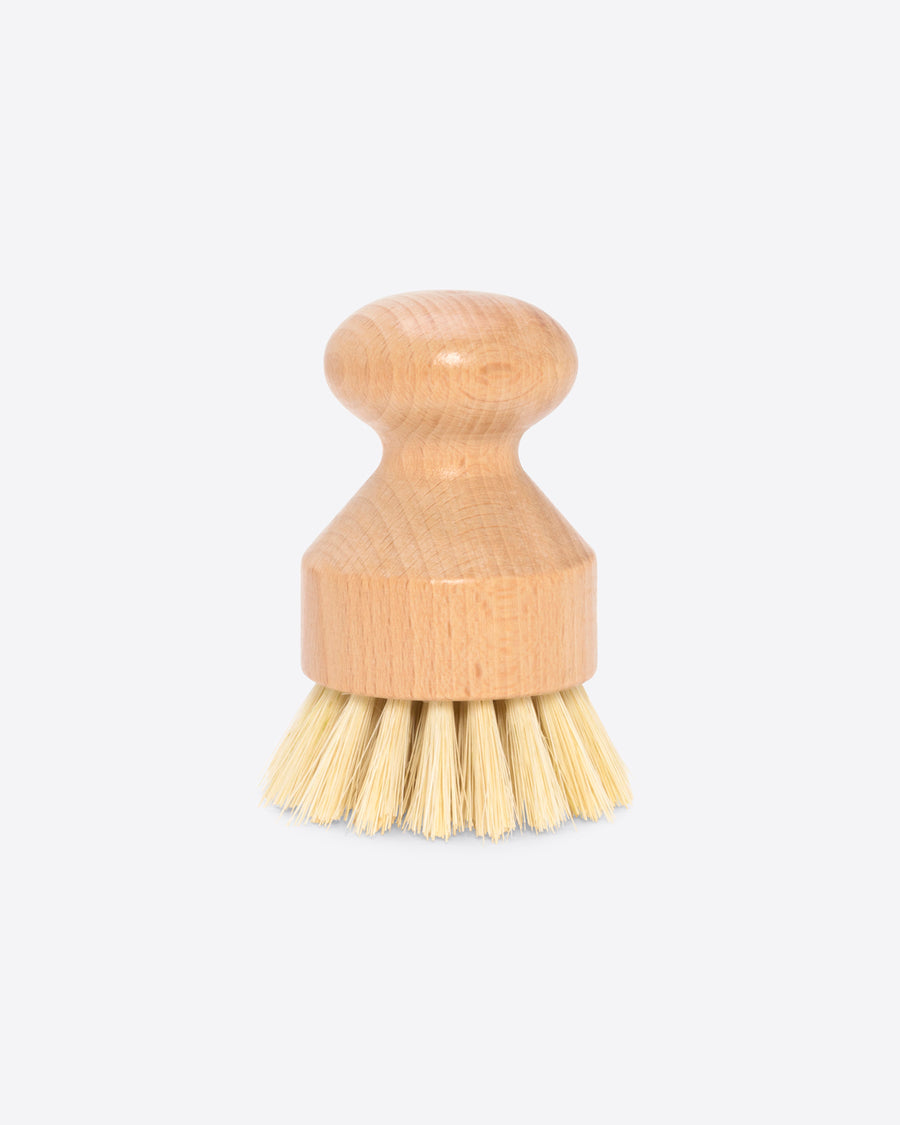 hand dish brush with a wooden handle 