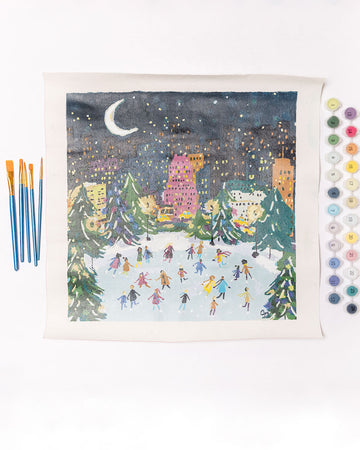 painted paint by numbers kit with central park ice skating scene and comes with canvas, paintbrushes and paint