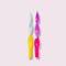 set of two colorful dipped candles