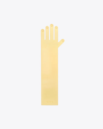 Brass bookmark shaped like a hand and arm