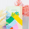 editorial image of the gratitude journal with colorful hand cover