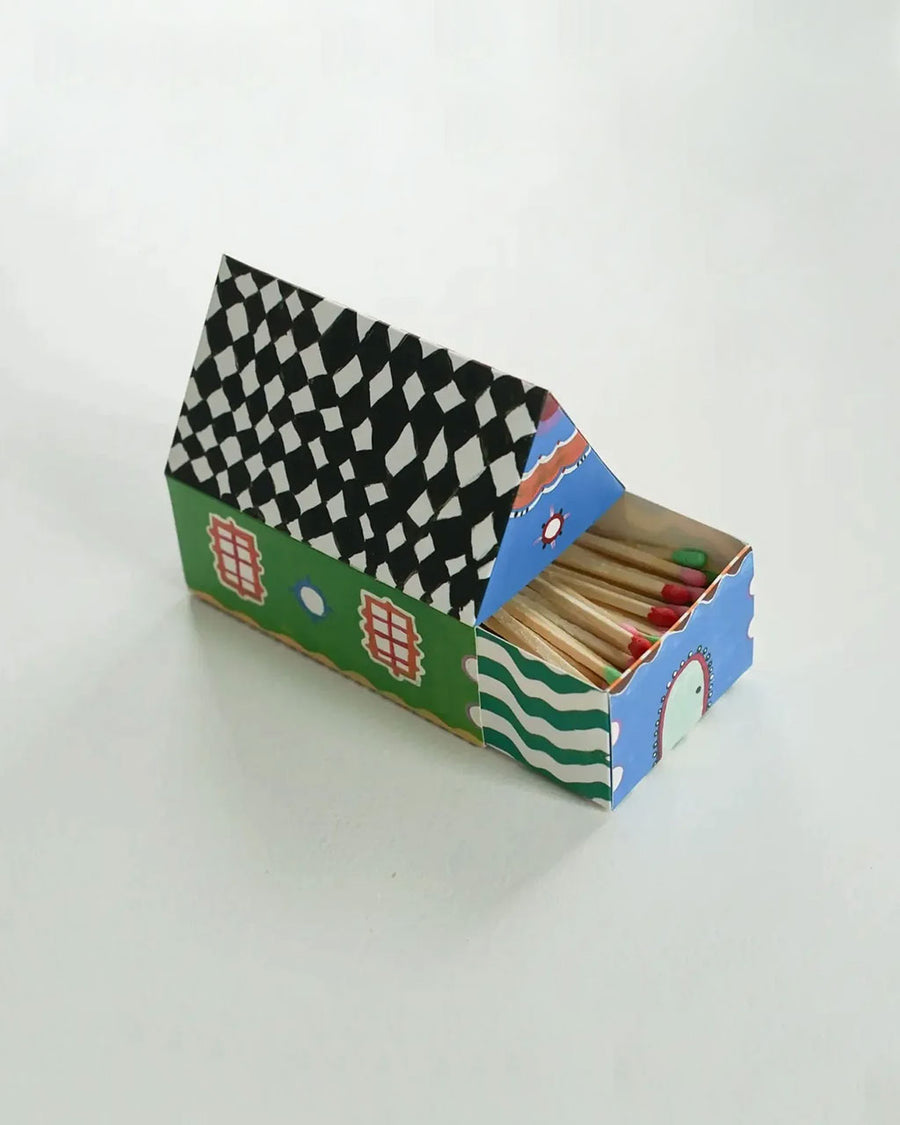 matches in a colorful house shaped box