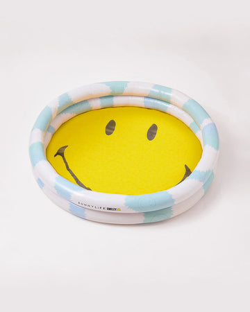 inflatable pool with blue and white sides with yellow smiley center