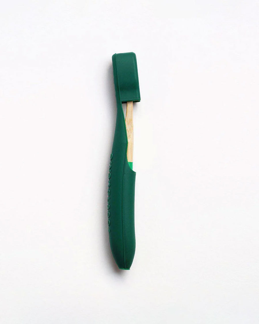 green bamboo toothbrush with matching cover