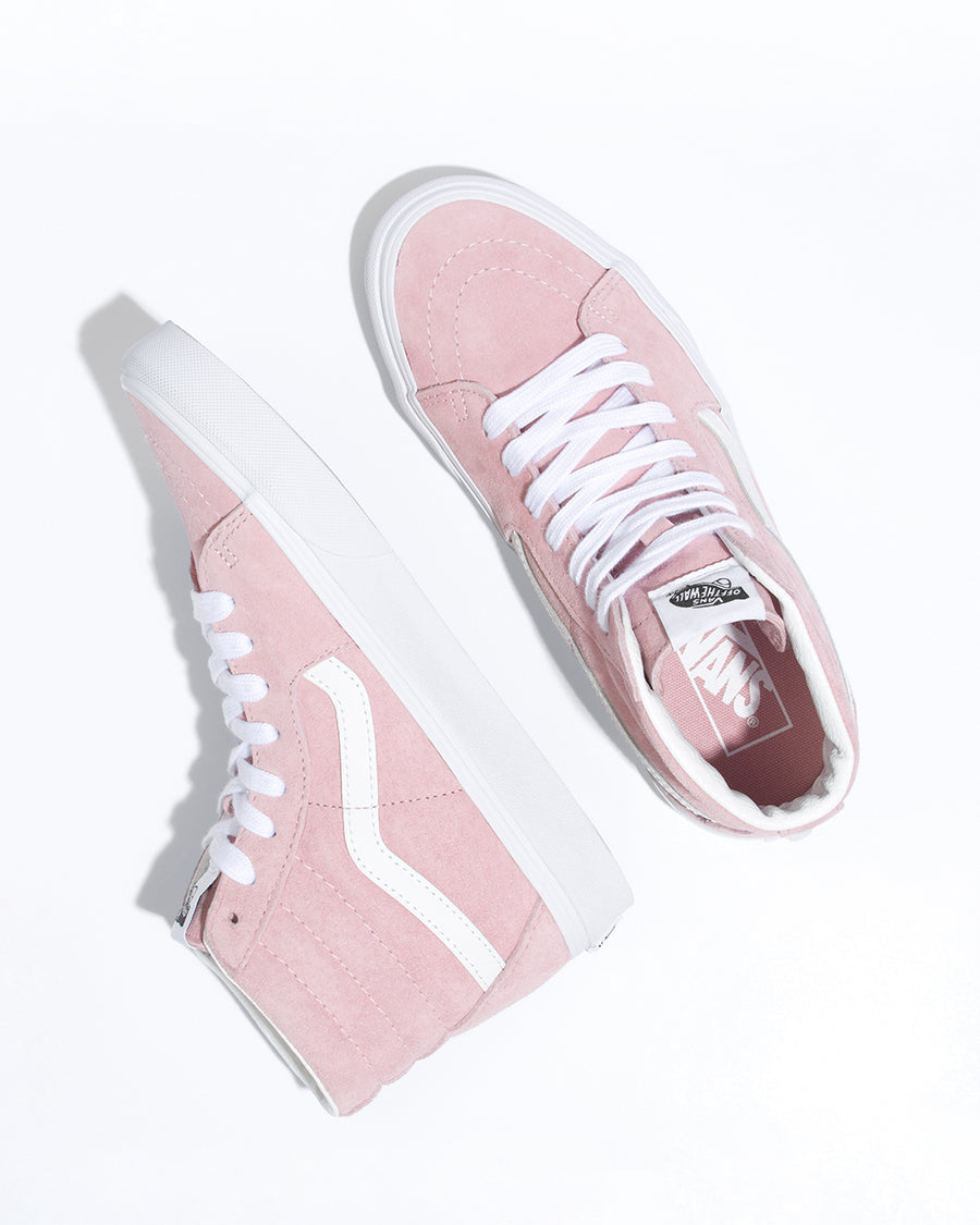 pair of Vans Sk8-Hi sneakers in pink with white detail and sole