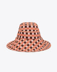 wide brim hat with multicolor plaid in the colors of brown, peach, pink and light pink
