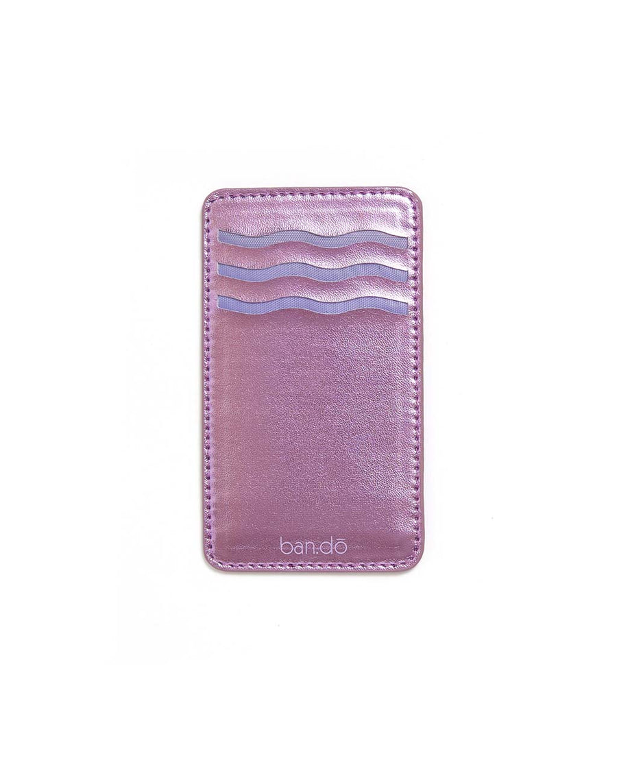 Features a lilac leatherette exterior and nylon interior.