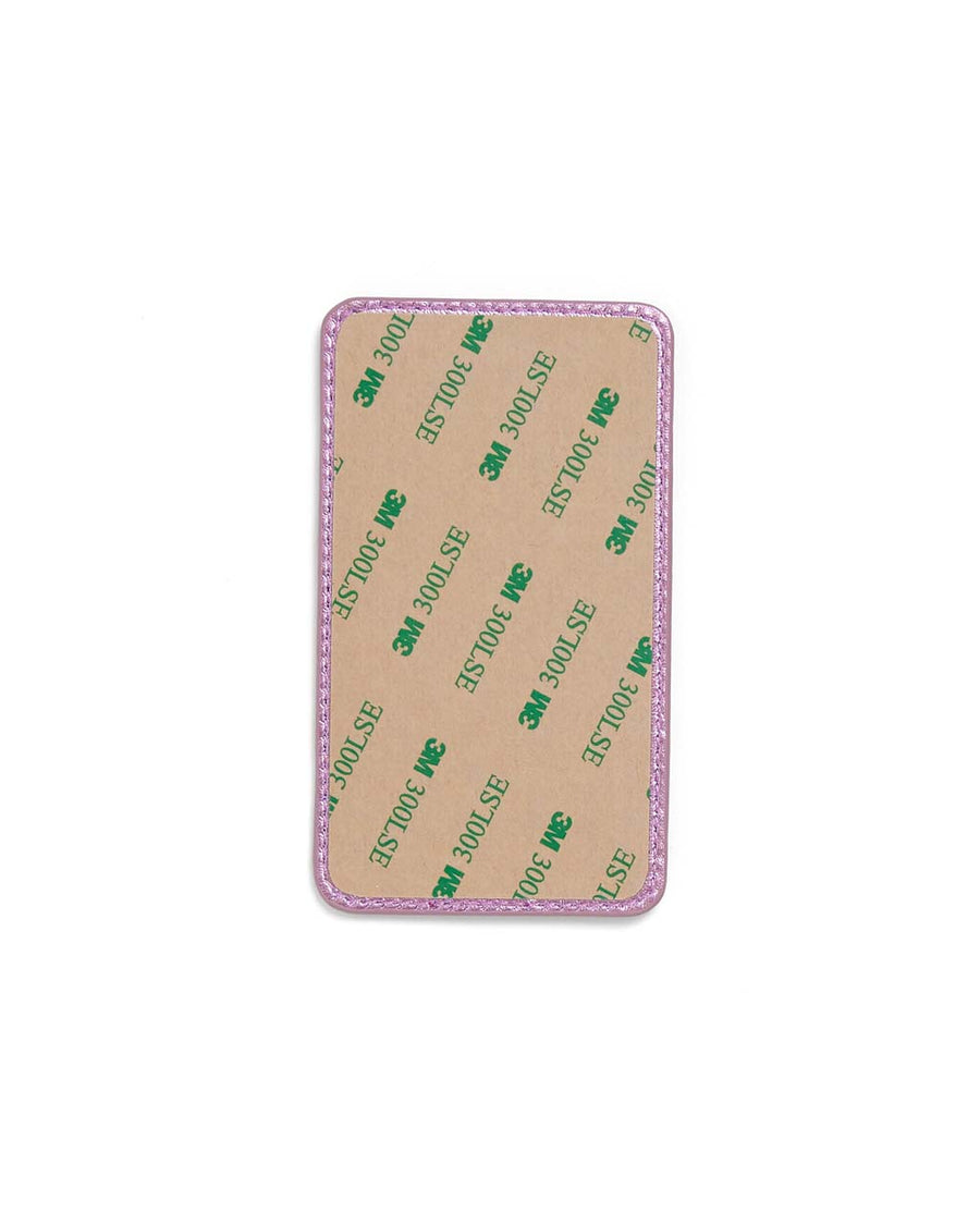 Adhesive back sticks to any phone or phone case.