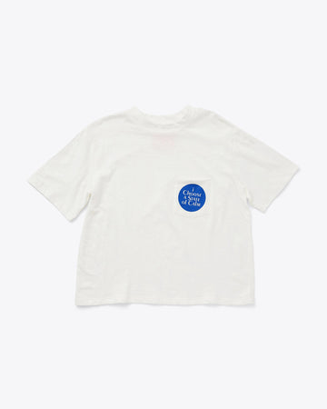 white box tee with a patch pocket with a blue circle design and the words i choose a state of calm