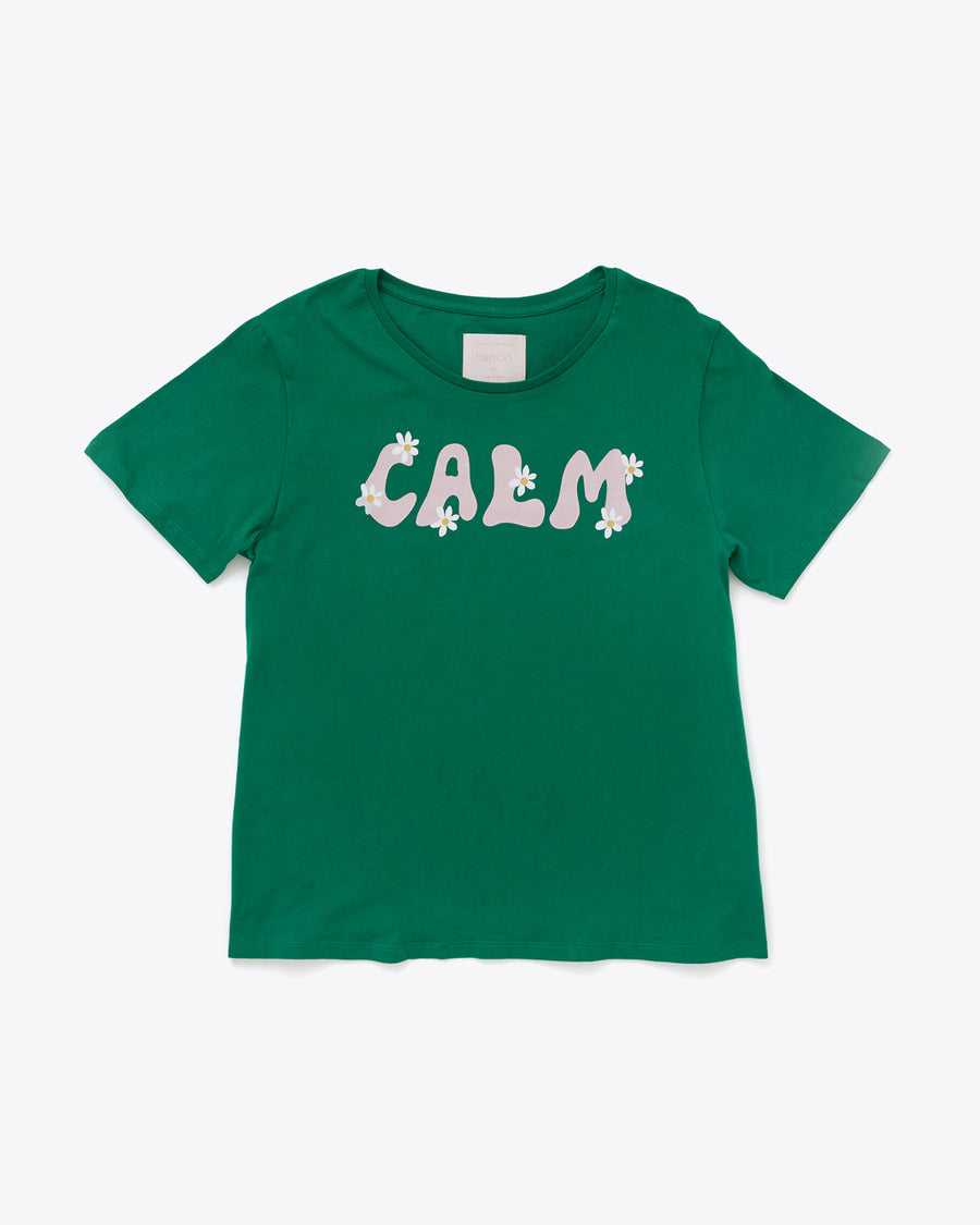 green calm graphic tee with daisy accents