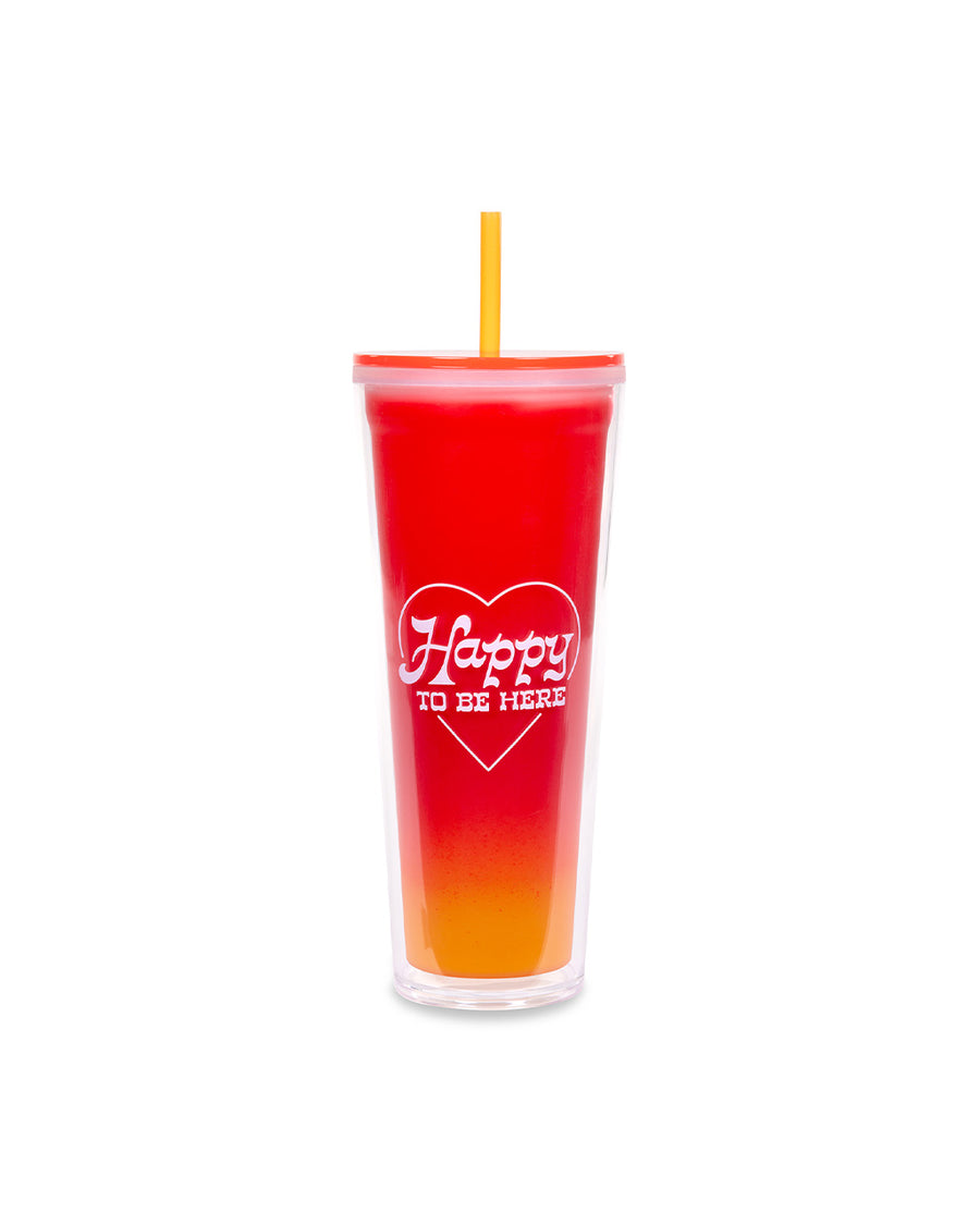 24 oz color changing tumbler with red and orange ground (when changed) and white 'happy to be here' on the front