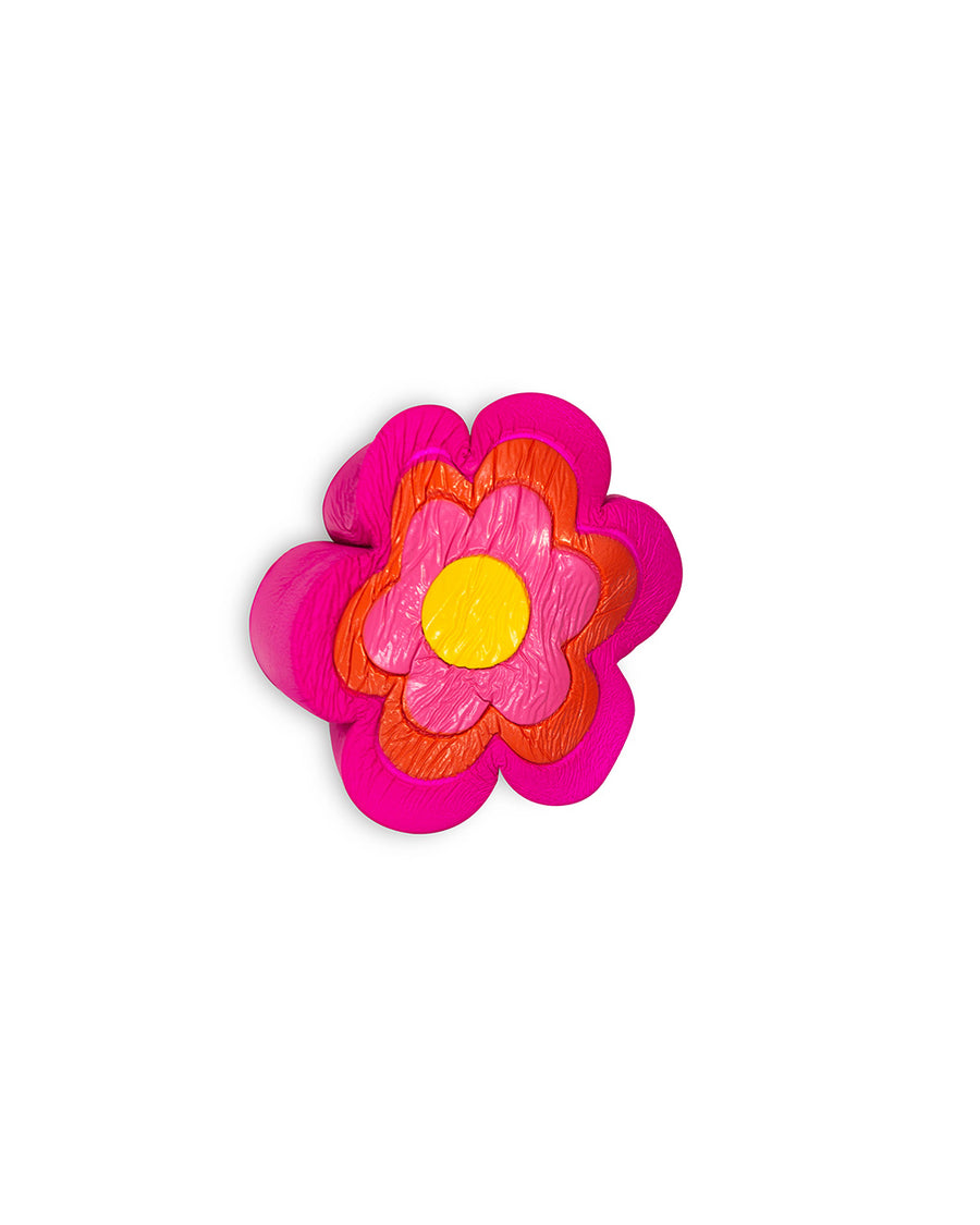 squished pink, red, and yellow flower shaped de-stress ball