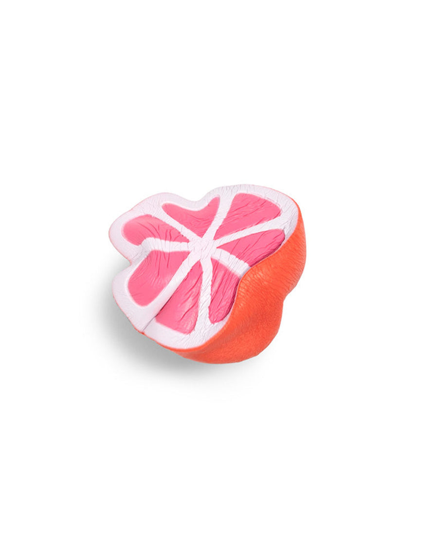 pink grapefruit de-stress ball squished