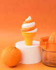 orange and white swirl creamsicle ice cream cone de-stress ball with orange and orange juicer