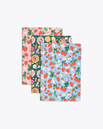 set of 3 notebooks in various floral patterns