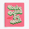 pink journal cover with "You're Doing So Well" bubble text graphic in ivory and green