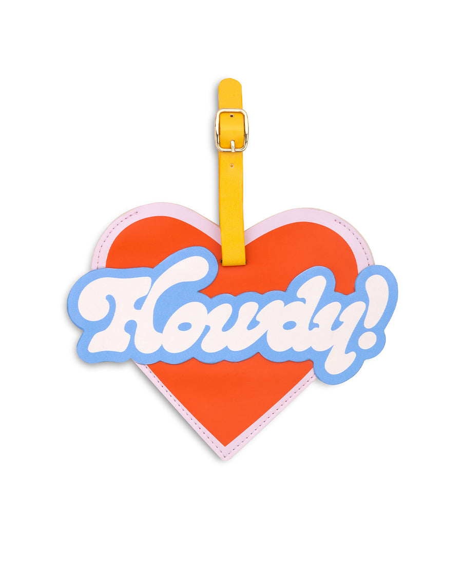 red heart shaped luggage tag with blue and white 'Howdy!' in bubble letters
