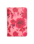 Leatherette passport holder in a pink floral motif.