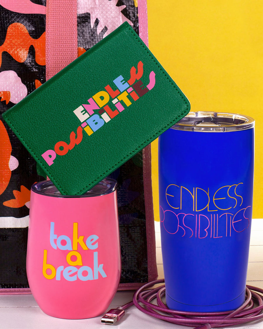 editorial image of endless possibilities wallet, take a break wine glass, and endless possibilities mug 