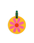 yellow travel tag with pink daisy and green strap