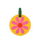 yellow travel tag with pink daisy and green strap