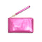 This Getaway Travel Wallet comes in a shiny metallic pink.