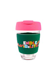 12 oz. dark green and hot pink glass travel mug with multicolor words 'endless possibilities'