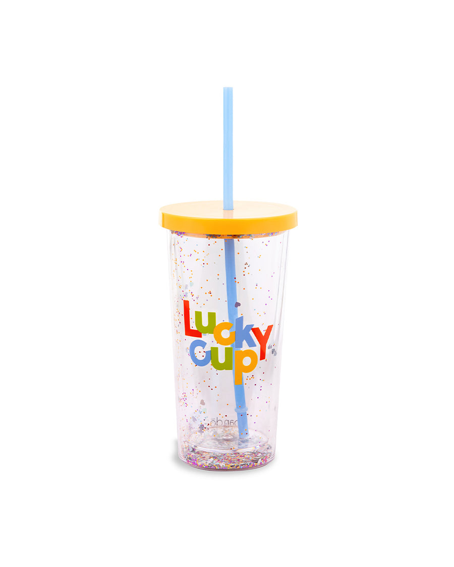 glitter sip sip tumbler with yellow lid and colorful' lucky cup' across the front