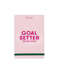 goal setter sticker book with pink cover and green elastic band