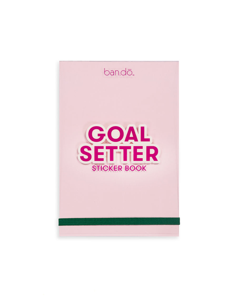 goal setter sticker book with pink cover and green elastic band