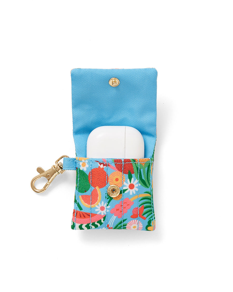 inside of earbuds case with blue ground and all over abstract fruit print with gold clasp