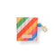 back view of earbuds case with diagonal rainbow stripes and gold clasp