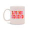 ceramic mug with white ground and link and red 'living legend' across the front