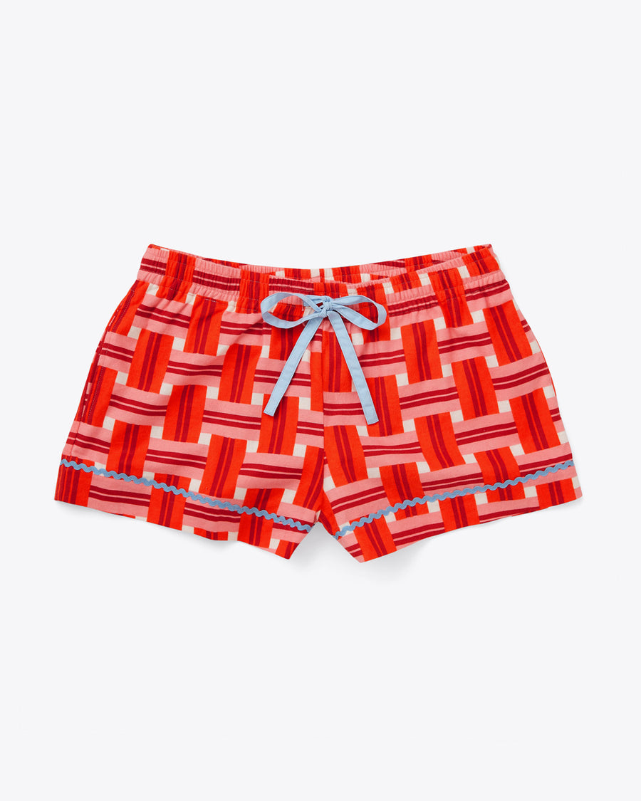 pajama shorts in red and pink basket weave plaid pattern with blue tie waist and ric rac trim