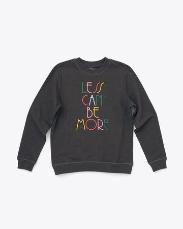 black longsleeve sweatshirt with multicolor "LESS CAN BE MORE" text graphic in modern font