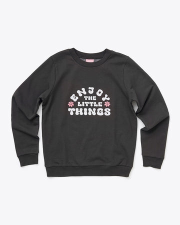 black sweatshirt with 'enjoy the little things' in white lettering