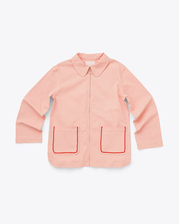 light pink work jacket with zipper front and ric rac on front patch packets