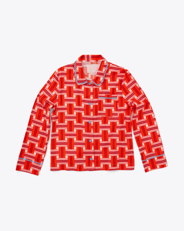 long sleeve pajama shirt in red and pink basket weave plaid pattern with blue ricrac trim detail and blue buttons