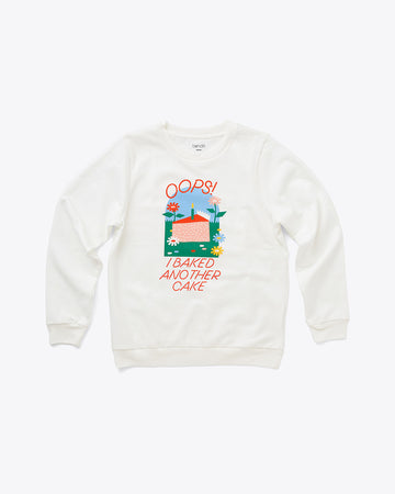 white sweatshirt with 'oops! i baked another cake' and cake graphic on front