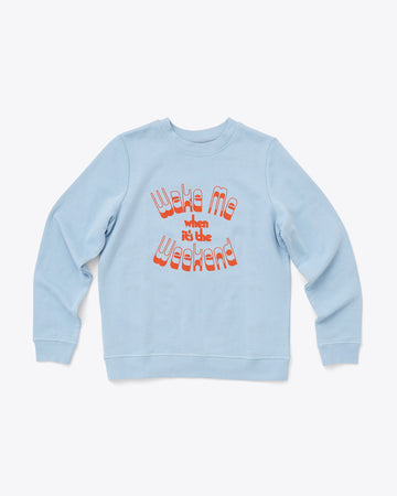 light blue sweatshirt with word art reading wake me when it's the weekend
