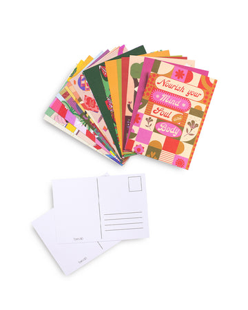 set of multicolor postcards in different prints scattered