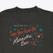 close up of back of black tee with a word graphic featuring a martini glass