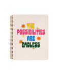 large notebook with light pink cover and with the text 'the possibilities are endless'