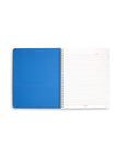 inside of notebook with blue pocket and lined paper